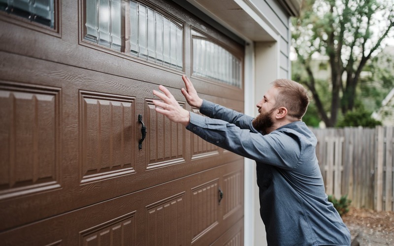 What to Do if Garage Door Starts Closing on Someone